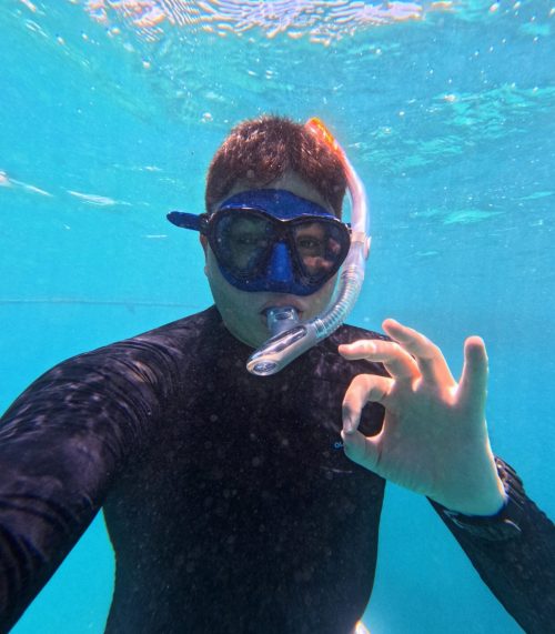 photo of a freediver giving the ok sign